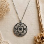 Ancient Tribal oxidised silver pendant with intricate circular tribal detailing and antique finish.