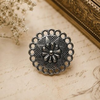 Antique Mandala oxidised silver ring with an intricate floral centre, geometric star pattern, dotted texture, and circular scalloped border.