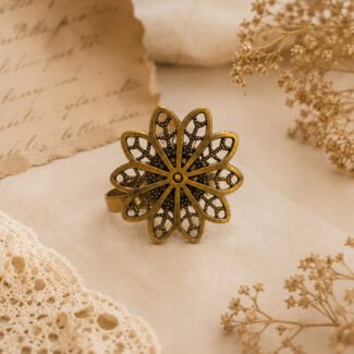 Antique oxidised floral ring with intricate filigree detailing and a vintage finish.