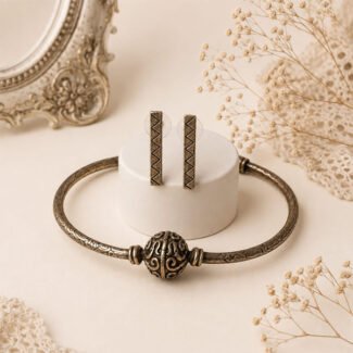 Timeless oxidised choker with hollow curved pipes, medium oxidised bead and black thread