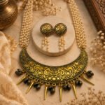 Antique Moon Charm Pearl Set featuring a handcrafted multi-strand pearl necklace with an antique crescent pendant and matching pearl drop earrings in a vintage-inspired design.
