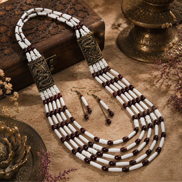 Classic-Maroon-Ivory-Necklace-Set Classic Maroon Ivory beaded necklace set with matching earrings, featuring layered white and maroon beads with antique dragon-pattern metal panels.