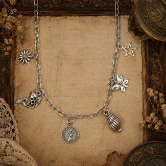 Handcrafted silver charm pendant featuring a silver-tone chain with coin, shell, butterfly, star, flower, and bird charms. A modern aesthetic statement necklace for everyday and casual wear.