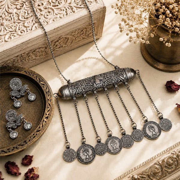 Antique-Coin-Drop-Necklace-Set4 Handcrafted Antique Coin Drop Oxidised Necklace Set with matching earrings featuring intricate floral motifs and vintage coin charms in an antique silver finish.