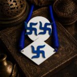 Handmade Blue Swastik Necklace Set with matching stud earrings, hand-painted in royal blue on a white base, lightweight ethnic jewellery for festive and everyday wear.