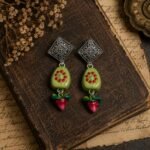 Handmade Botanical Buds Clay Earrings with hand-painted clay buds, oxidized stud tops, lightweight design, and nature-inspired detailing.