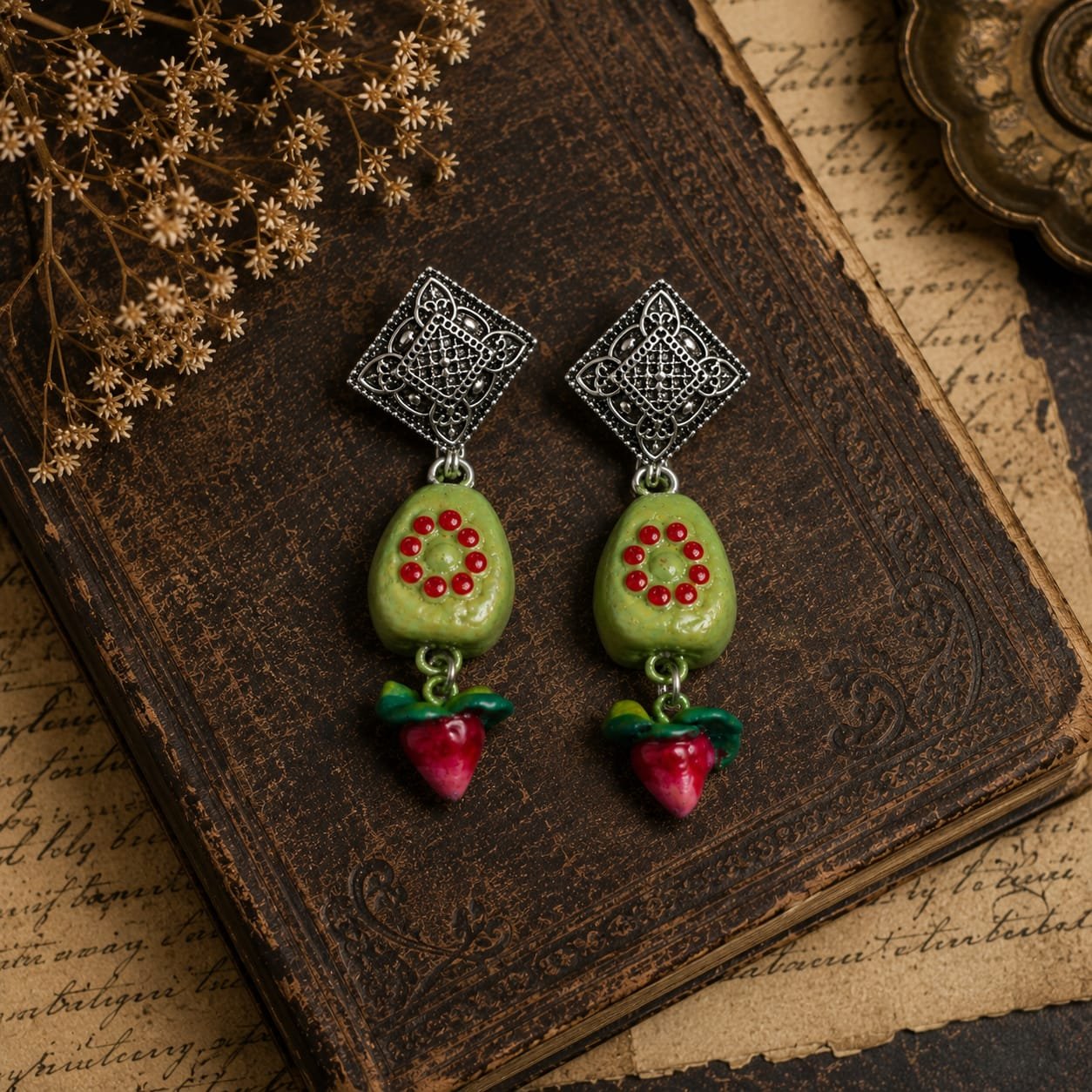 Handmade Botanical Buds Clay Earrings with hand-painted clay buds, oxidized stud tops, lightweight design, and nature-inspired detailing.