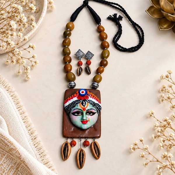 Clay-Devi-Antique-Necklace-Set Clay Devi Antique Necklace Set with handcrafted clay goddess pendant, earthy semi-precious stones and traditional charms.